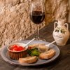 BRUSCHETTA PUGLIESE <img src="https://osteriadelborgobari.it/wp-content/uploads/2025/01/glutine.svg" width="17px"><img src="https://osteriadelborgobari.it/wp-content/uploads/2025/01/lattosio.svg" width="17px">