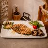 GRILLED SWORDFISH <img src="https://osteriadelborgobari.it/wp-content/uploads/2025/01/pesce.svg" width="17px"> <img src="https://osteriadelborgobari.it/wp-content/uploads/2026/06/SimboloPiattoUnico.svg" width="17px" style="padding-bottom:1px">